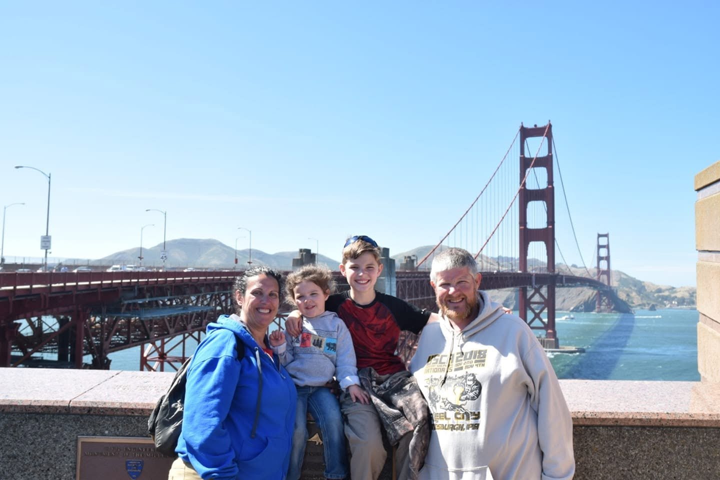 Jan, Paul and family in front of the Golden Gate Bridge